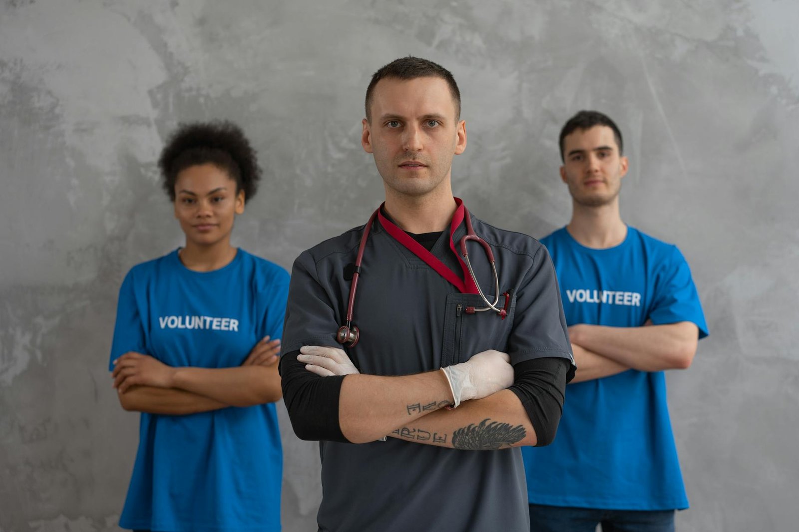 Healthcare workers and volunteers standing together in solidarity